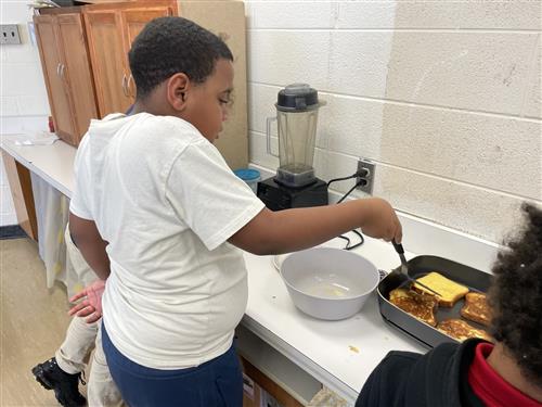 Male student cooking